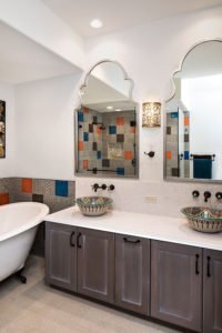 A Moroccan-inspired bathroom in Palo Alto features unique sinks and tile work.