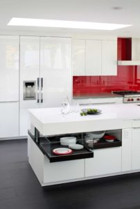 Glass front drawers allow homeowners to put special serveware on display