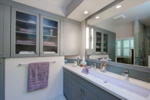 A serene bathroom in Palo Alto with a unique dual vanity.
