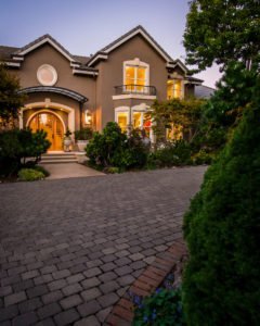 driveway leading up to view of house