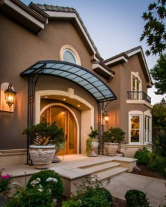 A contemporary home in Atherton includes touches of whimsy, and an art nouveau-inspired awning.
