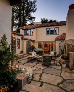 outdoor seating next to house exterior