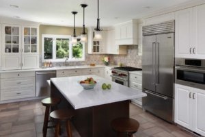 A baker's dream kitchen in Palo Alto includes a large island and appliance garage.