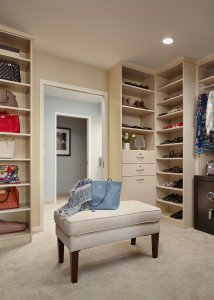 A walk-in closet gives this Los Gatos homeowner a chance to display her wardrobe and handbags.