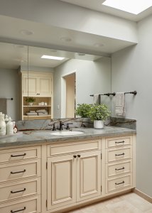 Large mirrors in this luxurious Los Gatos bathroom make the space feel bright and spacious.