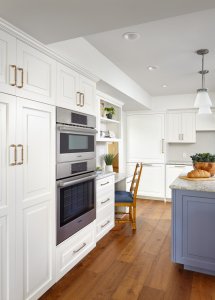 A small desk provides a place to sit ad work while dinner is underway in this Los Gatos kitchen.