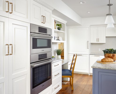 A small desk provides a place to sit ad work while dinner is underway in this Los Gatos kitchen.