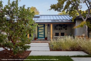 A modern home in San Jose adds a touch of playfulness with a colorful, geometric front door.