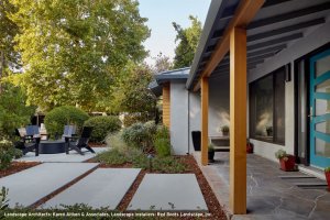 A home in San Jose features a sleek firepit area in the front yard.